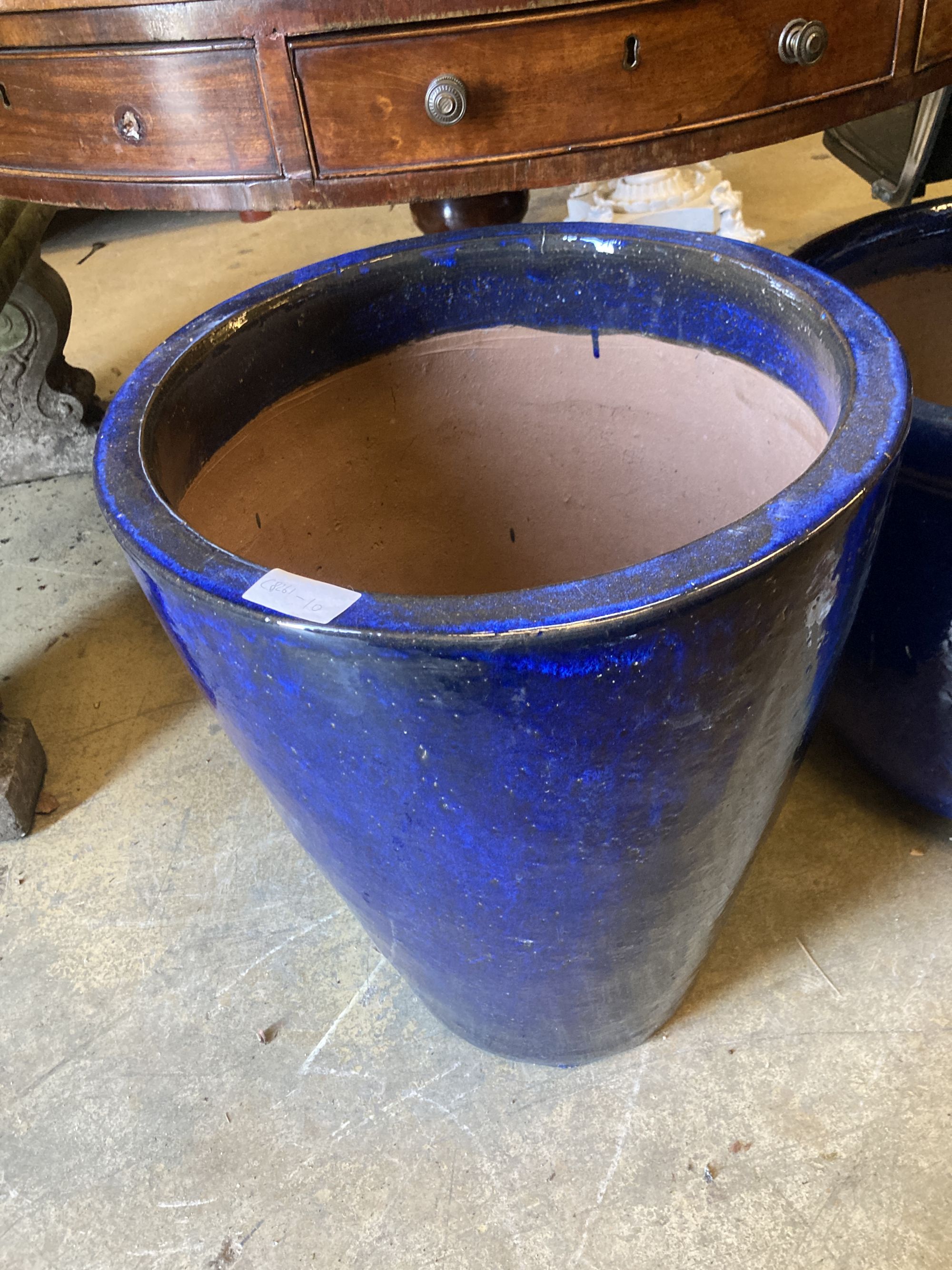 Two blue glazed circular garden planters, larger 54cm diameter, height 46cm